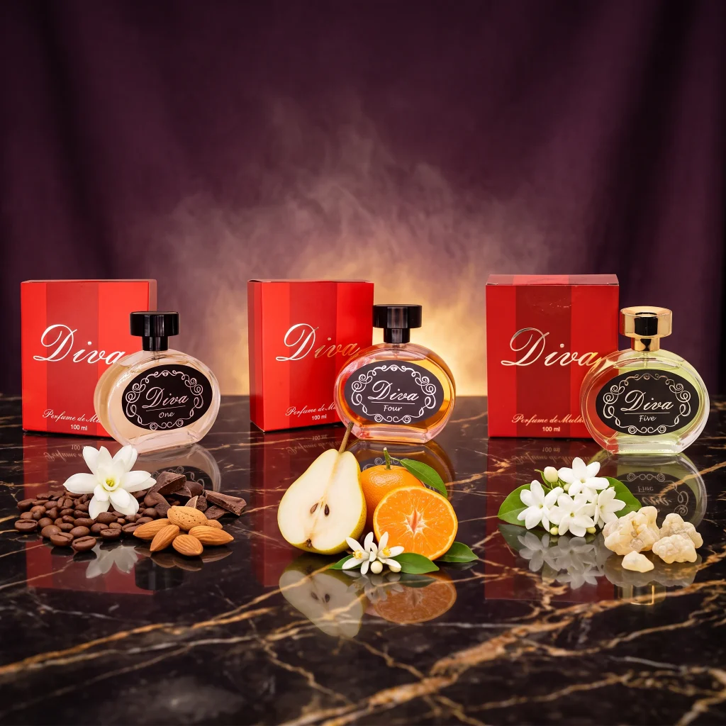 Kit Promocional Diva com os perfumes Diva One, Diva Four e Diva Five e suas caixas, com café, amêndoas, pera, tangerina e jasmim sobre mármore